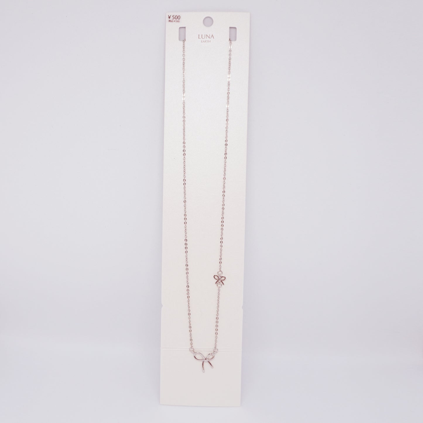 Bow Long Necklace in Silver