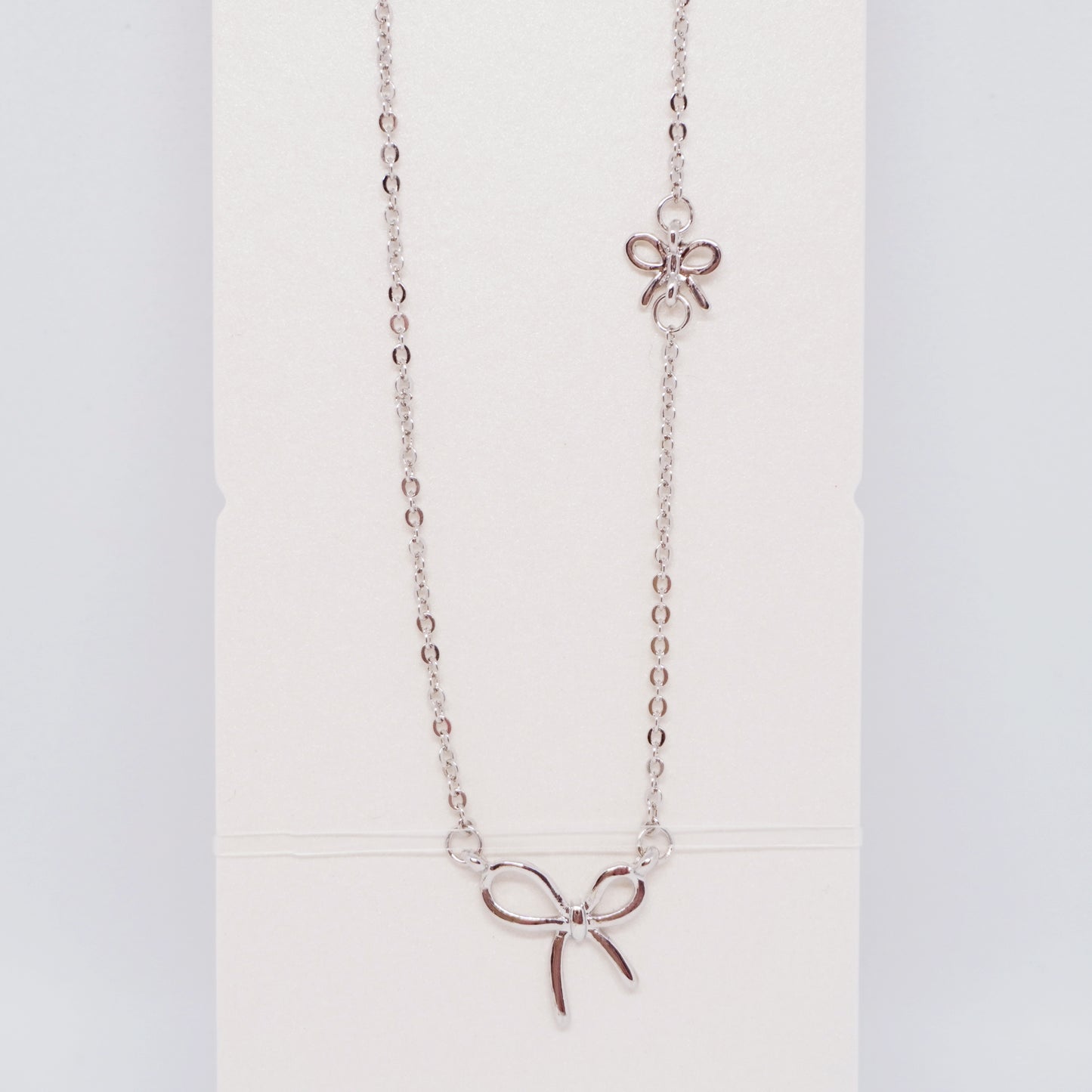 Bow Long Necklace in Silver